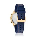 Relógio com pulseira azul de couro com detalhes vermelhos, caixa dourada e mostrador prateado.