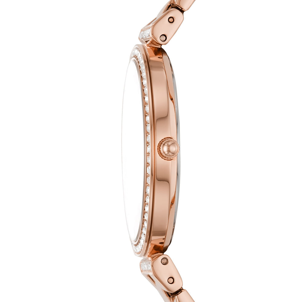 Relógio feminino com pulseira de metal rosé, caixa adornada com detalhes brilhantes e mostrador delicado.
