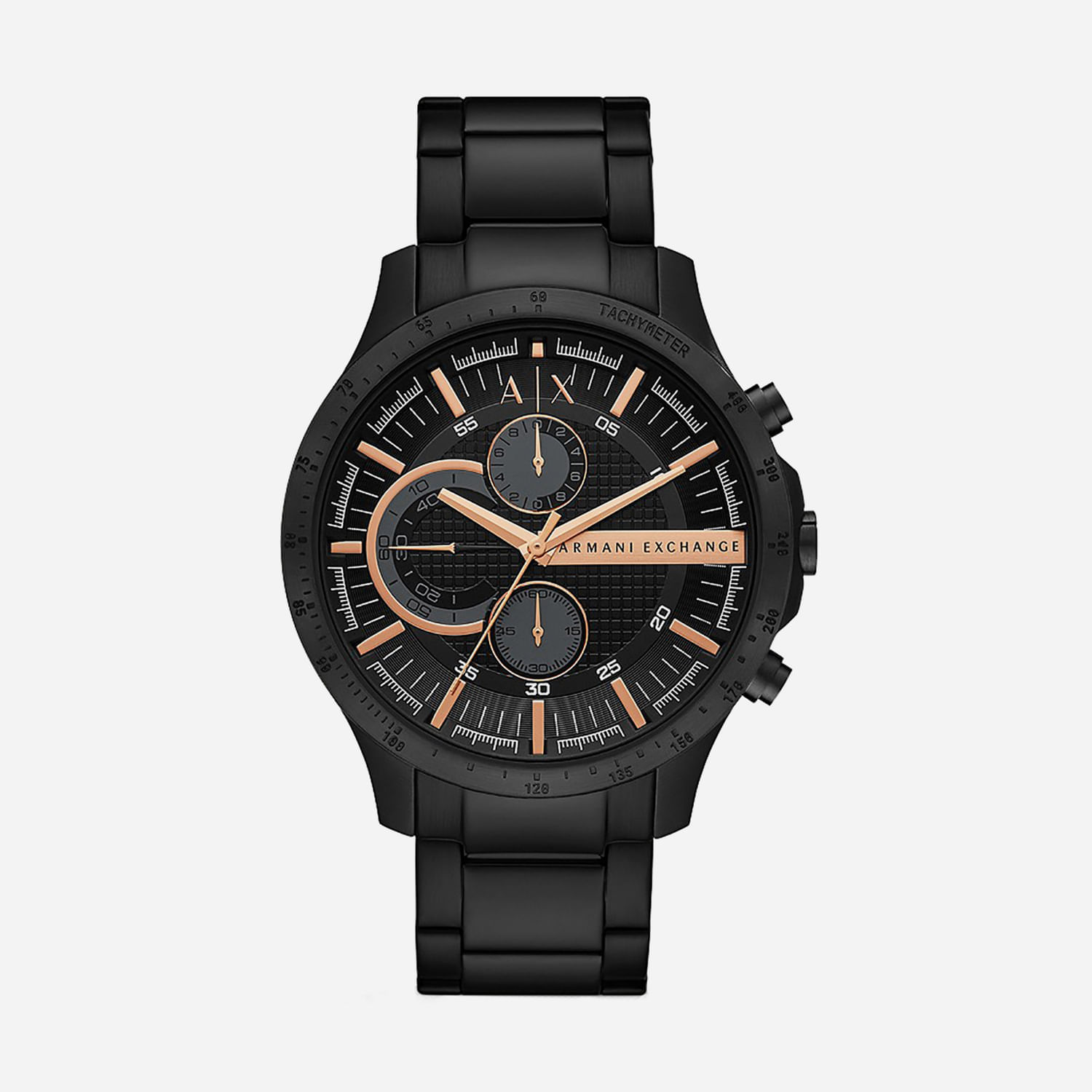 Relógio preto com pulseira de metal, mostrador com detalhes em rosa e dourado, marcadores e três pequenas janelas de cronógrafo.