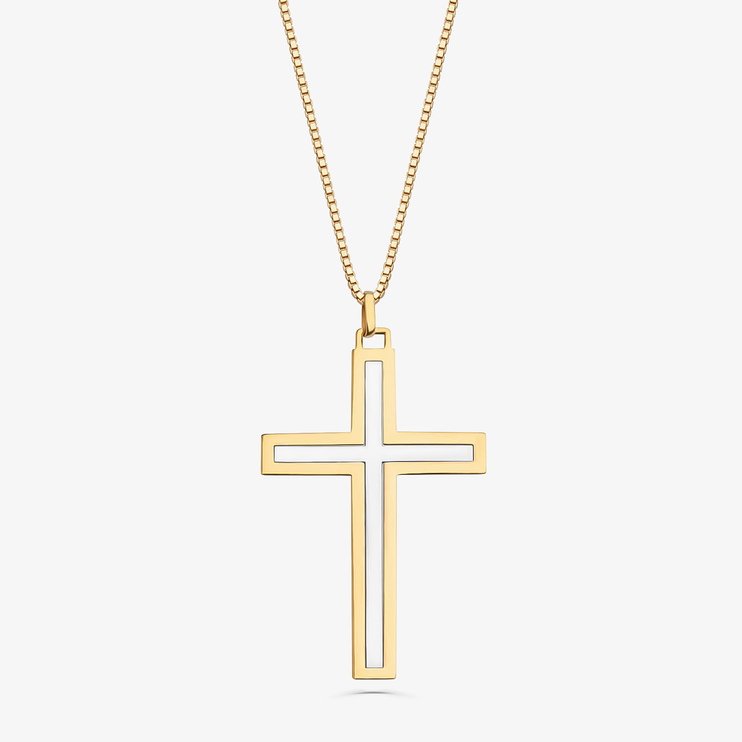 Corrente dourada com pingente de cruz aberta em estilo minimalista.